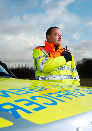 Traffic Officer using mobile radio comms 