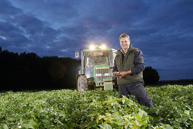 commercial photographer manchester, manchester, Potato harvest, tractor in field, night, farming