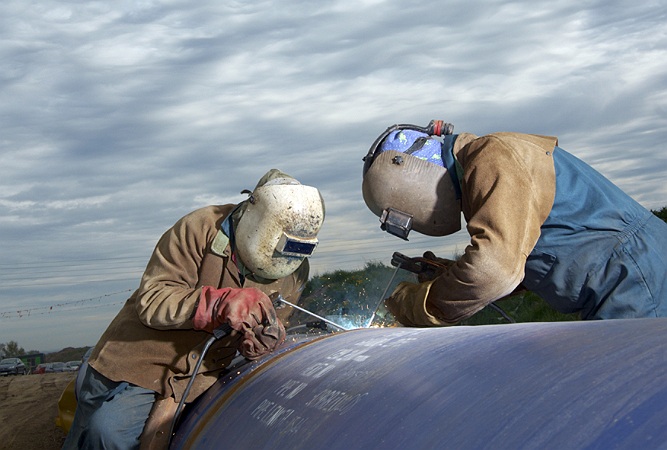 commercial photographer manchester, Water pipeline installation, welding, UK